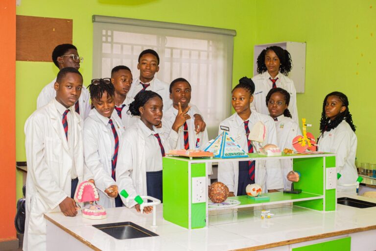 College science students in lab coats in the laboratory
